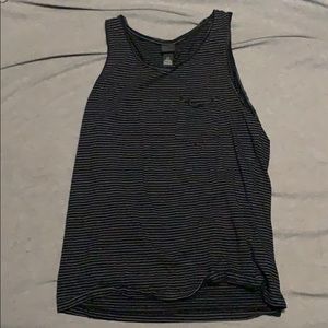 Medium sized Black with white strip tank top.